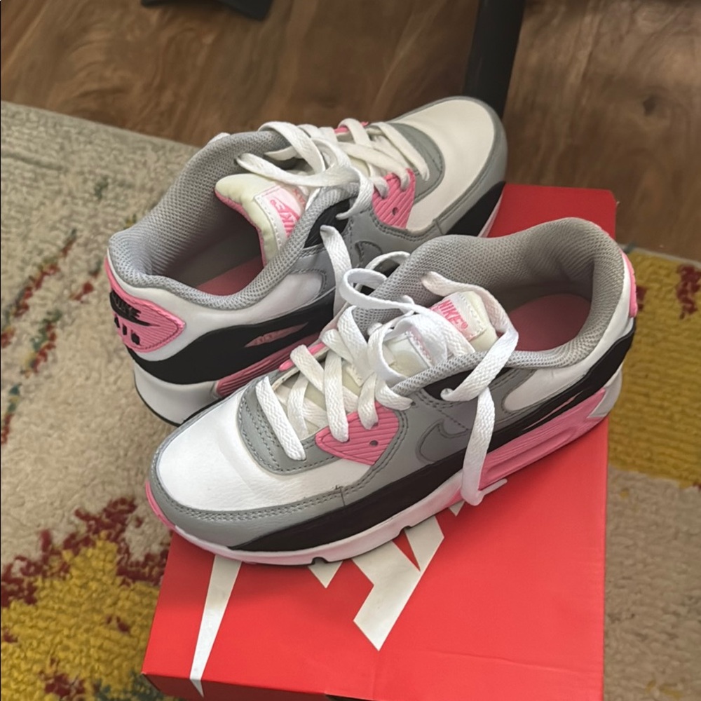Nike Pink and Black Sneakers for Active Style
